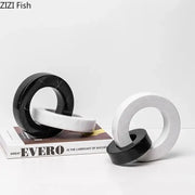 Abstract black and white marble round ring sculpture for living room decor featuring elegant marble round ring design