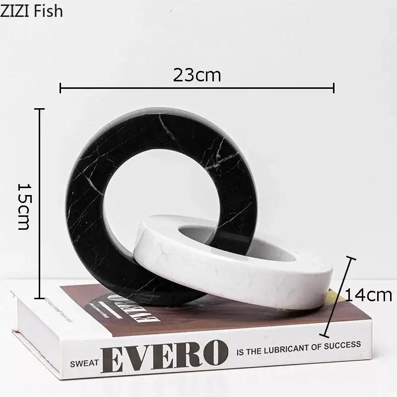 Abstract black and white marble round ring sculpture with sleek modern design for living room decor