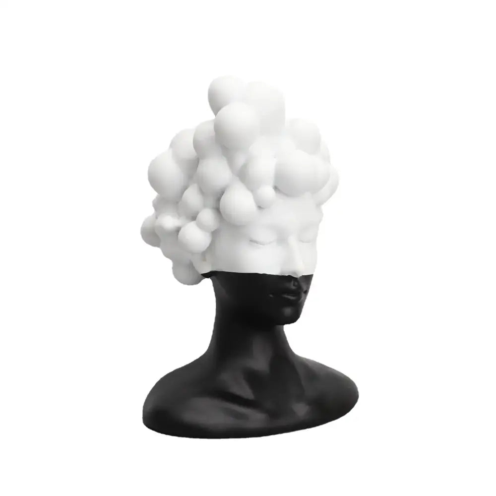 A sleek black and white woman figurine resin sculpture with bubble-textured head for decorbites abstract woman decor