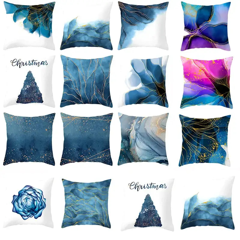 Set of twelve decorative cushion covers with abstract blue ink and gold edge marbled designs for living room use