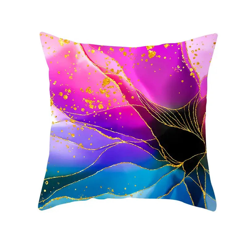 Vibrant cushion cover set featuring blue ink gradient with pink and purple hues and gold edge accents for living room