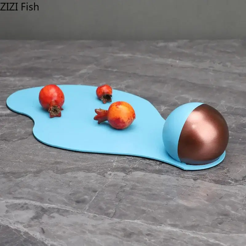 Abstract blue liquid ornaments desk sculpture featuring a blue and copper spherical footrest with a glossy finish