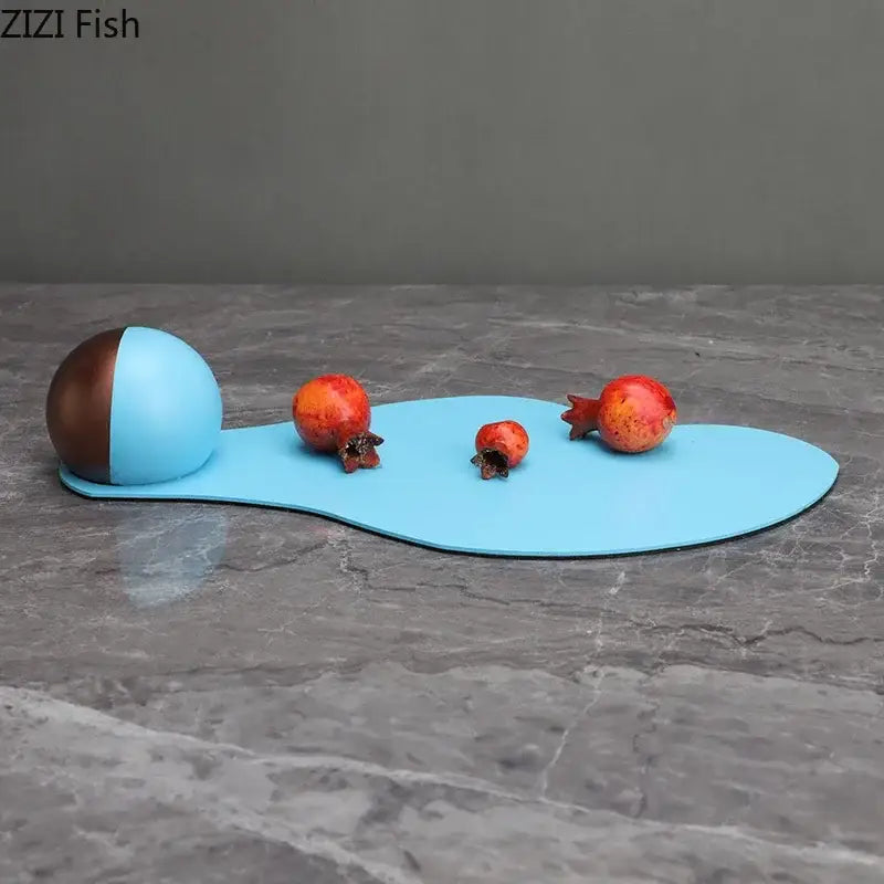 Abstract blue liquid ornaments desk sculpture featuring a light blue two toned spherical design for living room decor