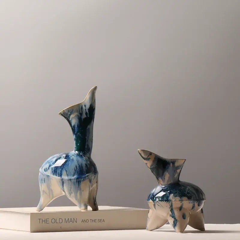 Two ceramic deer figurines with blue and white irregular ink pattern glaze for living room decor