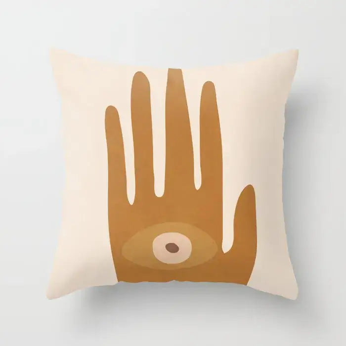 Cream-colored decorbites decorative pillowcase with a minimalist brown hand and eye design for living room decor