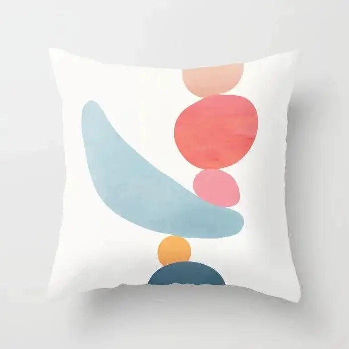 White throw pillow with modern abstract pastel geometric shapes in blue coral pink and navy from decorbites decorative pillowcase