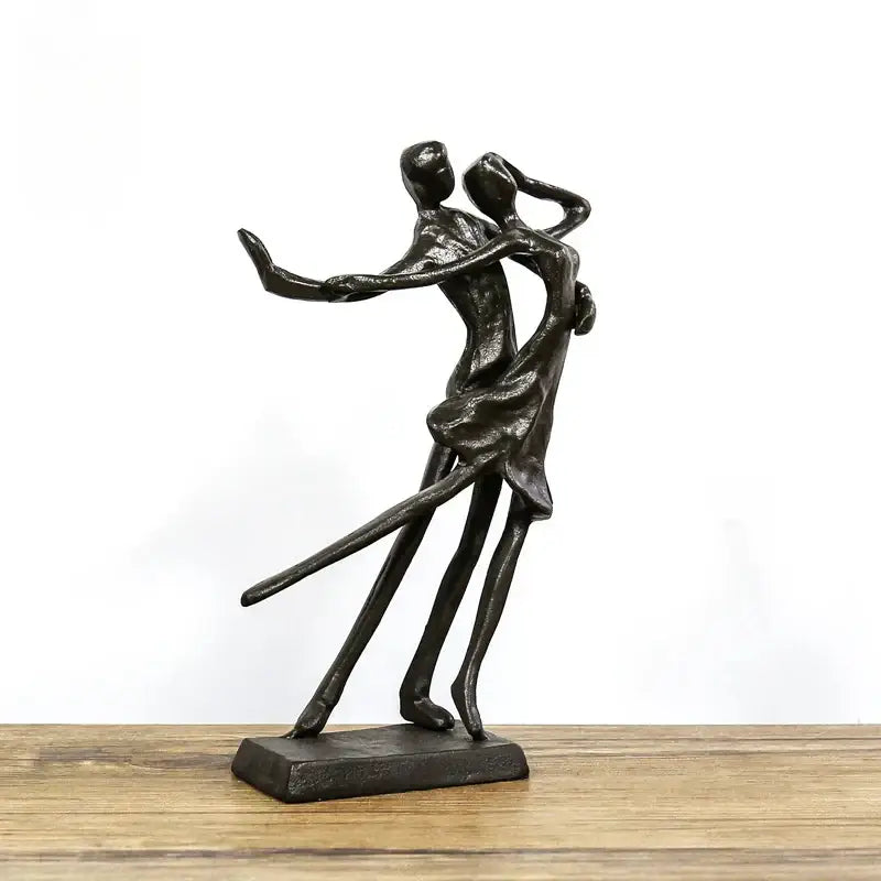Bronze-colored abstract couple dancers portrait sculpture with smooth forms on a minimalist base for decorbites decorbites couple dancers