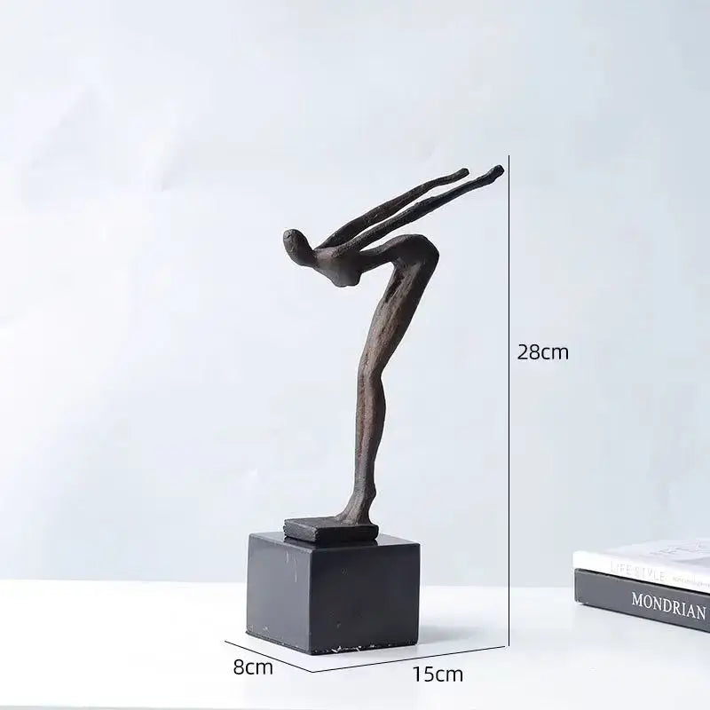 Abstract bronze diving sportsman metal sculpture in mid-air pose on black base for living room decor