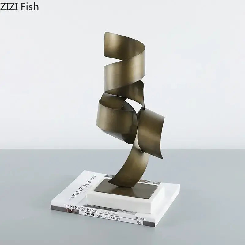 Abstract bronze irregular crimp metal sculpture with a spiral design on a white marble base for living room decor