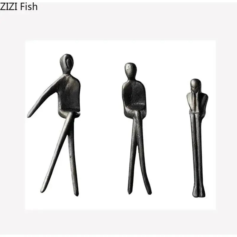 Three minimalist black metal figurines in a sculpture set for living room decorbites gold plated figure decor