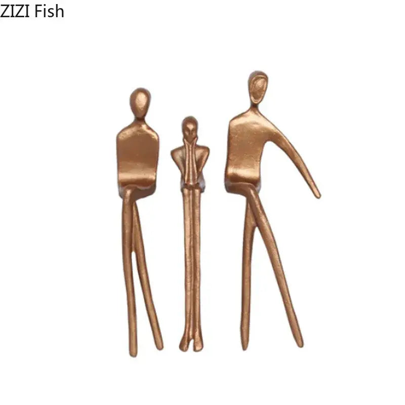 Bronze-colored abstract sculpture set featuring minimalist gold plated figure decorbites for living room decor