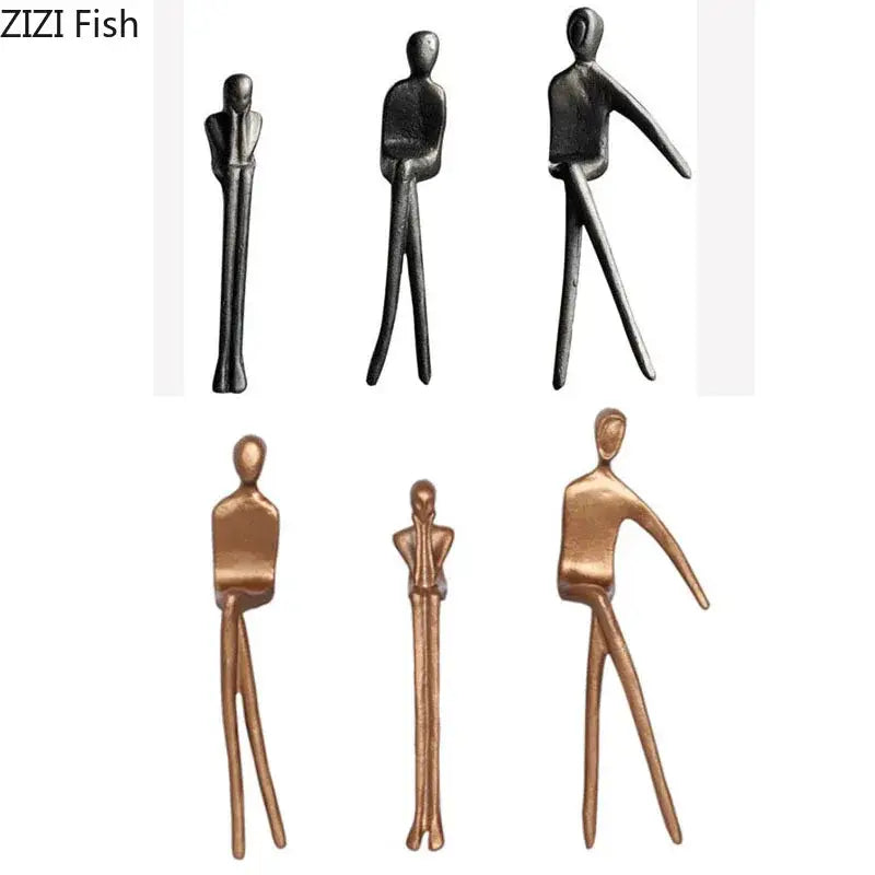 Abstract sculpture set featuring matte black and bronze gold plated figure decorbites gold plated metal minimalist designs