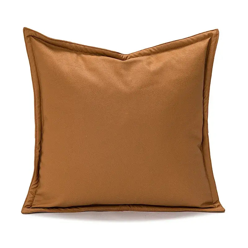 A tan faux leather pillow cover with smooth texture and stitched edges for burnt orange decorbites abstract plush decor