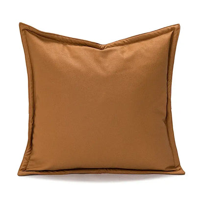 A tan faux leather pillow cover with smooth texture and stitched edges for burnt orange decorbites abstract plush decor