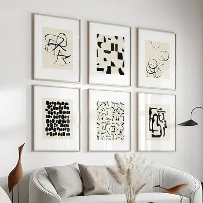 Six framed decorbites™ beige abstract canvas poster prints featuring black ink on off-white paper with silver frames