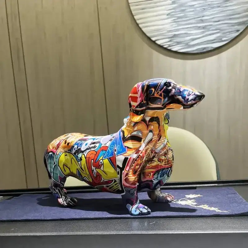 A colorful dachshund dog statue with vibrant graffiti-style street art designs for living room decor