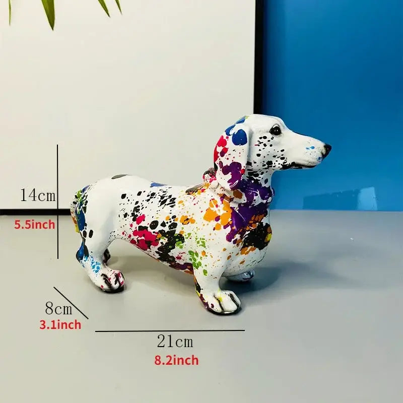 A white ceramic colorful dachshund dog figurine with vibrant purple orange pink and black splattered paint decorbites colorful dachshund