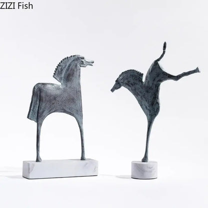 Two stylized matte dark metallic iron horse statues with subtle patina detail by decorbites for living room decor