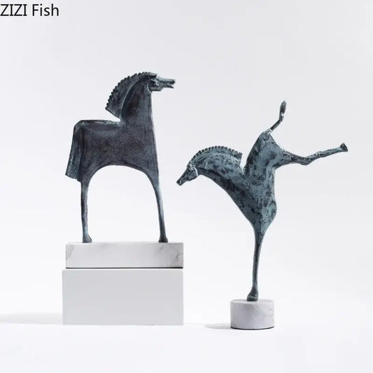 Two abstract dark metallic iron horse statues with stylized manes on white marble bases by decorbites iron decor