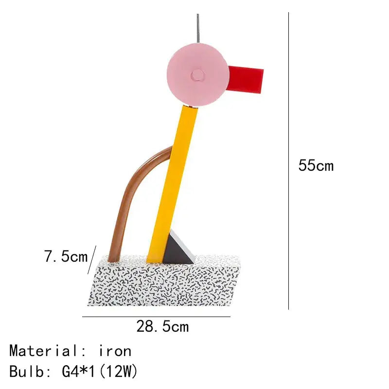 A modern abstract duck led table lamp with pink circular head red accent yellow brown curved arms on speckled base