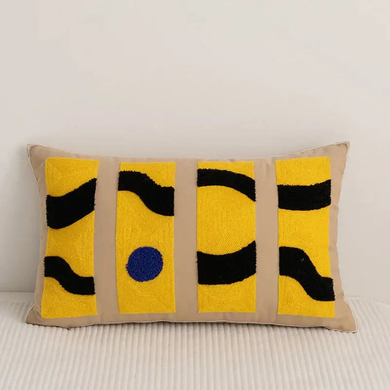 Beige rectangular embroidery pillow cover with abstract yellow panels, black wavy lines, and central blue circle for living room decor