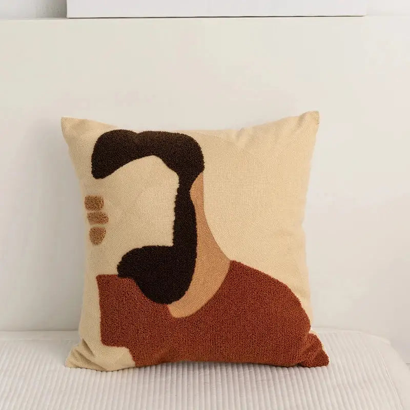 Beige embroidery pillow cover featuring an abstract pattern in brown and terracotta for living room decor