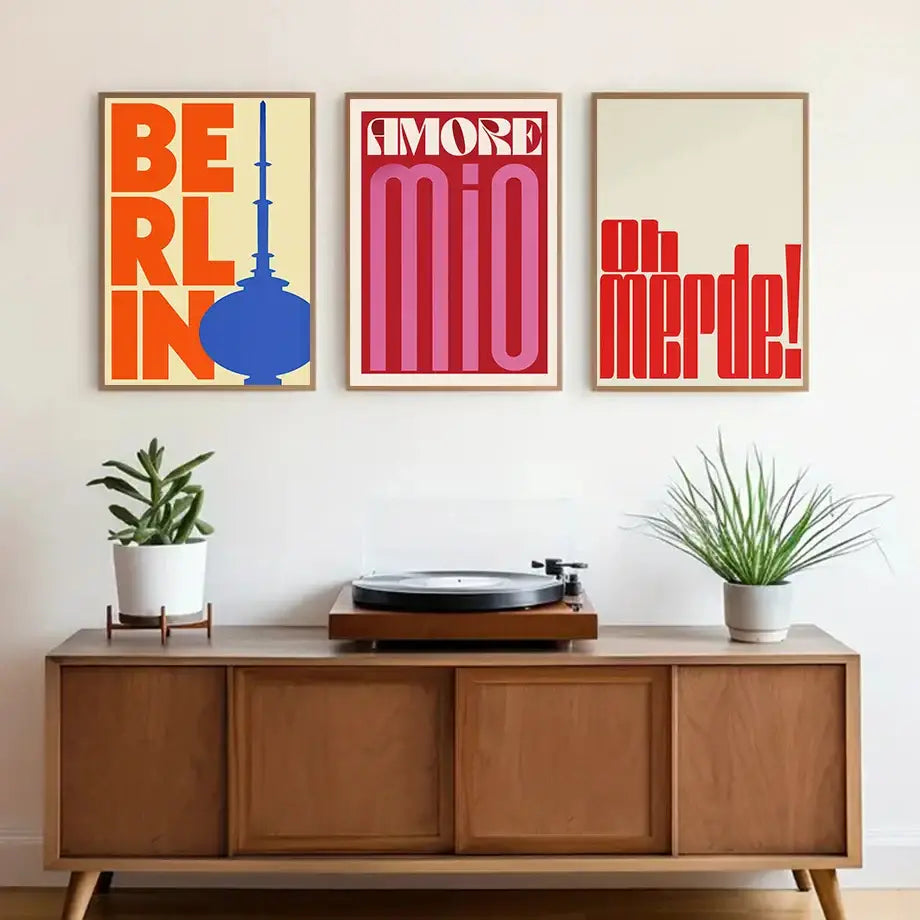 Mid-century modern wooden sideboard with black vinyl record player paired with DecorBites™ abstract flowers wall art