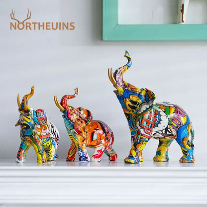 Vibrant graffiti-style decorbites elephant resin art statue in bold colors for living room decor