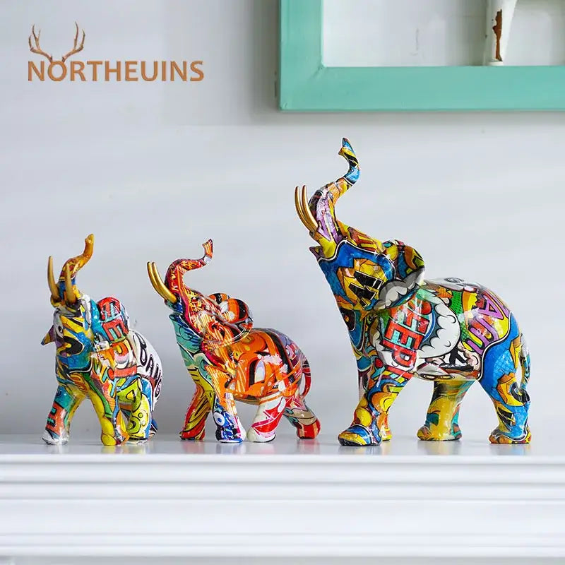 Vibrant graffiti-style decorbites elephant resin art statue in bold colors for living room decor
