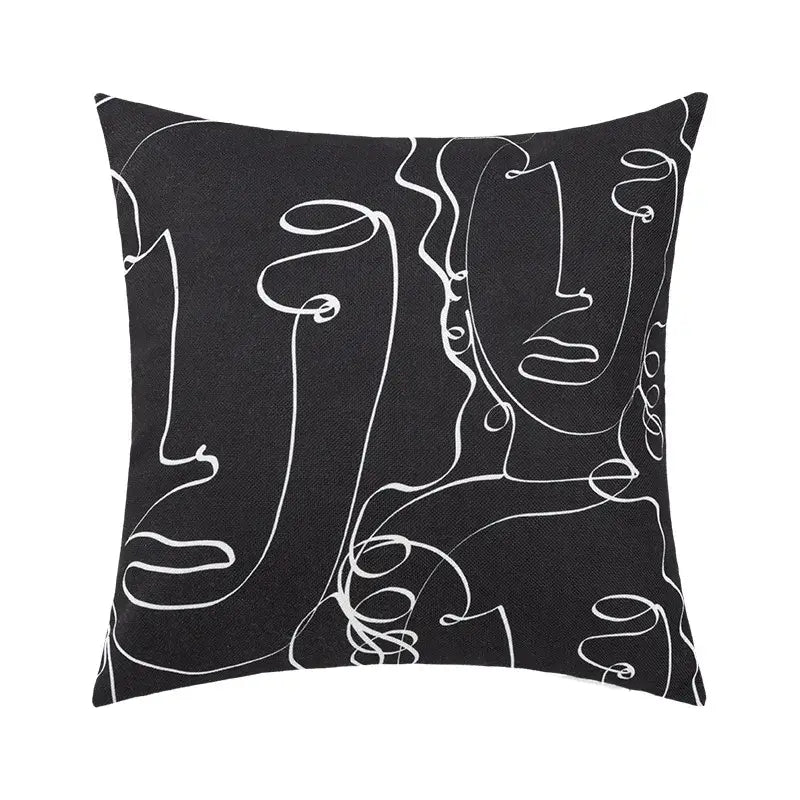 Black square pillow cover with abstract geometric print featuring white stylized faces for living room decorbites decor
