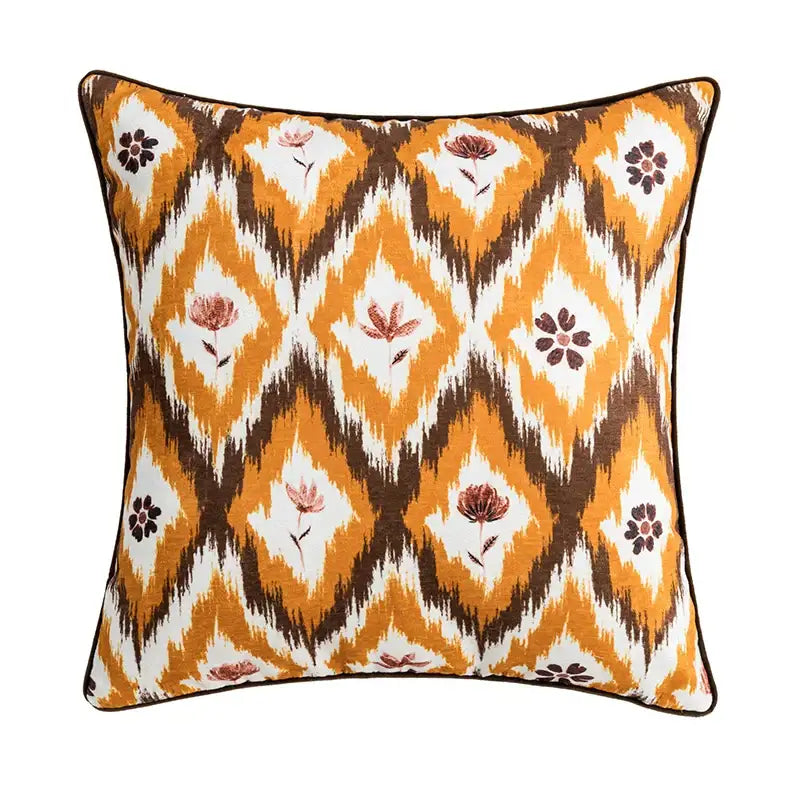 Square cushion cover with bold orange brown and white ikat stylized floral pattern for decorbites abstract geometric decor
