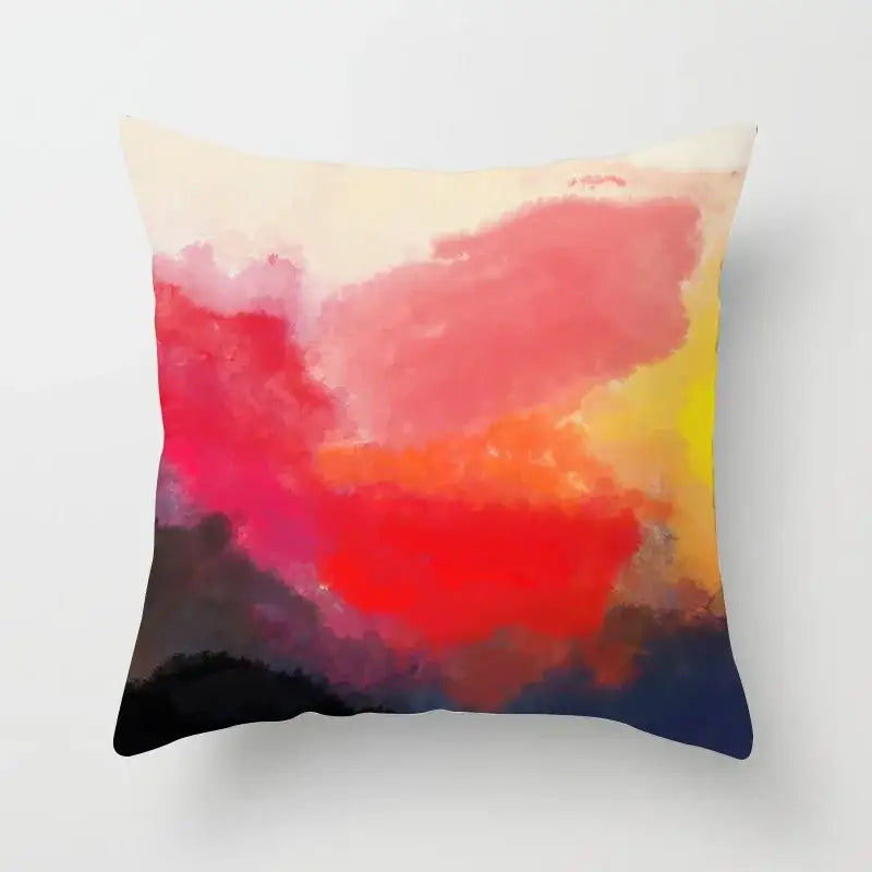 A square pillow cover with decorbites geometric stitch featuring a vibrant watercolor sunset print for living room decor