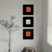 Three square-framed decorbites abstract geometric wall decoration pieces in orange and white for living room art