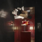Abstract geometric white and gold pendant lamp with interlocking metallic panels for living room decorbites big bang led