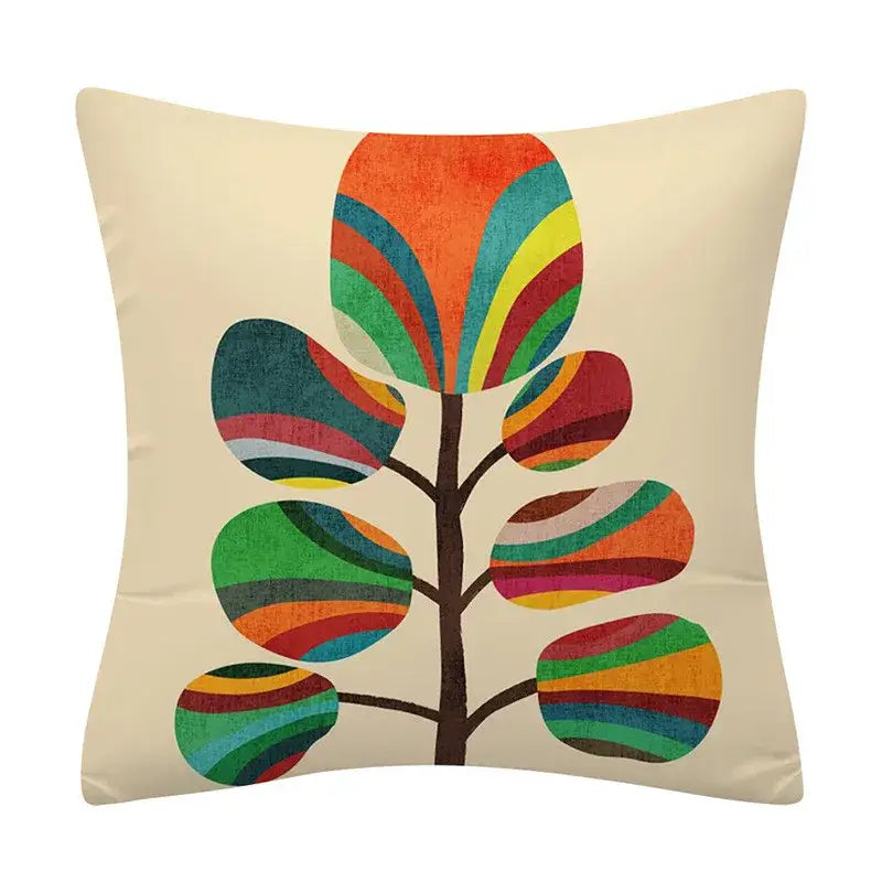 Cream-colored cushion cover with a decorbites geometry pattern featuring a stylized tree with rainbow-striped leaves
