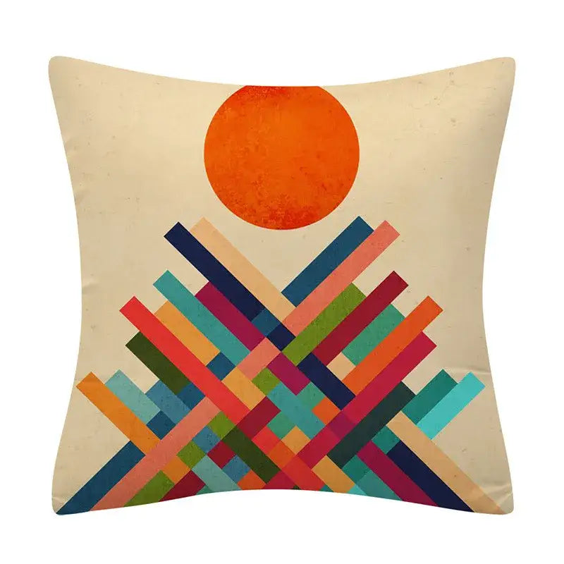 A square cushion cover with beige background and decorbites geometry pattern featuring colorful stripes and an orange circle