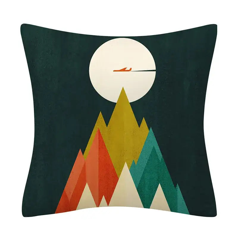 Square cushion cover featuring a decorbites geometry pattern with stylized mountains in orange yellow and teal against dark green