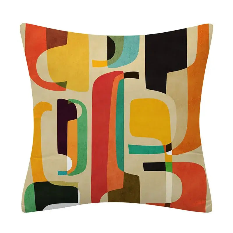 A square cushion cover with a decorbites geometry pattern featuring bold orange yellow teal and black shapes on beige background