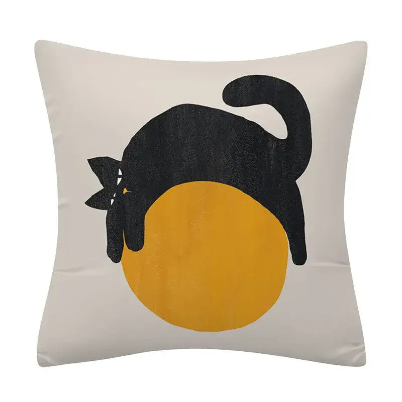 Cream-colored cushion cover with decorbites geometry pattern featuring a black cat silhouette and yellow circle background