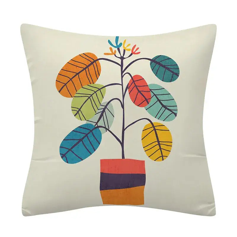Cream-colored cushion cover with vibrant multicolored stylized plant on off-white background decorbites geometry pattern