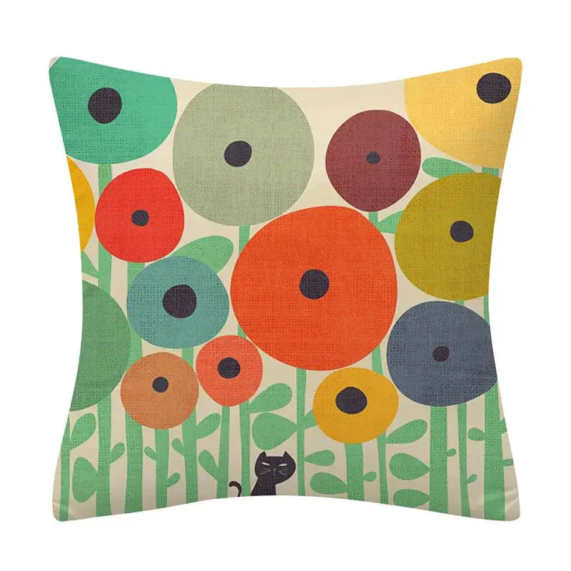 A square cushion cover with a vibrant decorbites geometry pattern featuring colorful circles on cream background