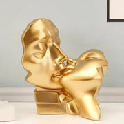 Abstract gold head couple sculpture with smooth glossy finish and geometric contours for living room decorbites abstract gold decor