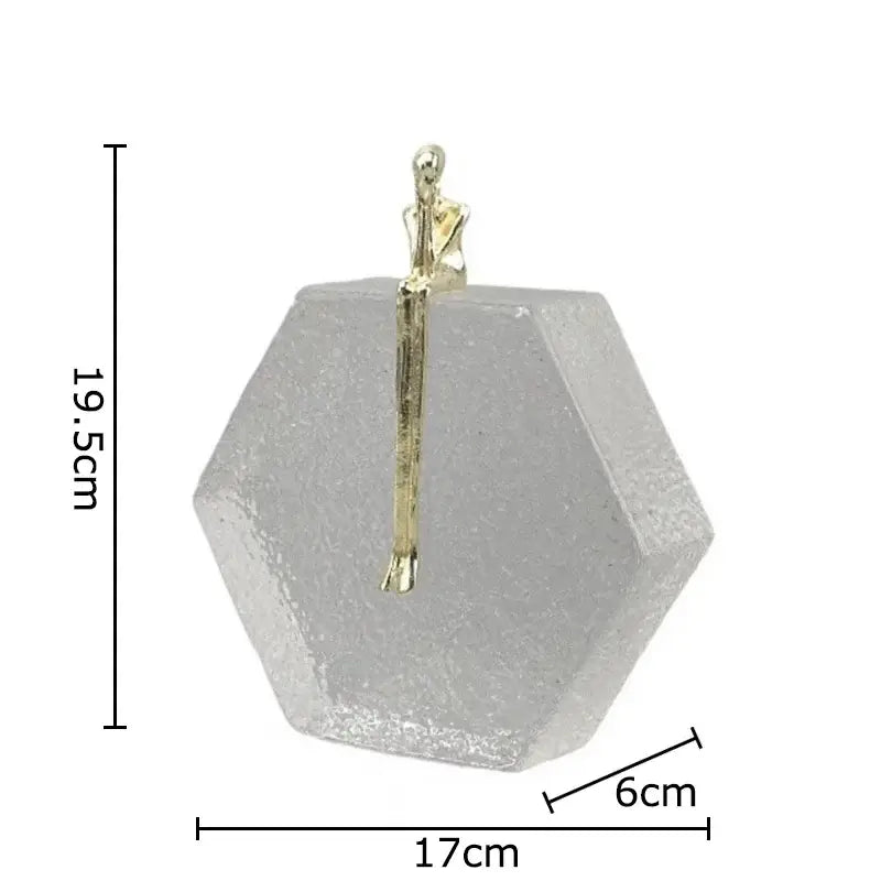 Abstract gold intertwined figures desk decor with a translucent hexagonal resin base decorbites crystal sculpture