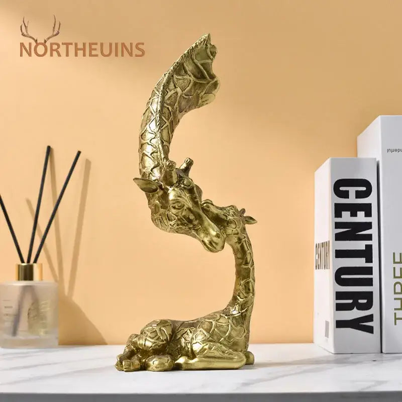 Golden abstract resin giraffe figurine with intricate textured pattern and elegant curved neck for living room decorbites decor