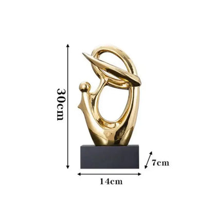 Golden geometric human decorative figurine with flowing abstract forms mounted on a black base for living room decorbites decor