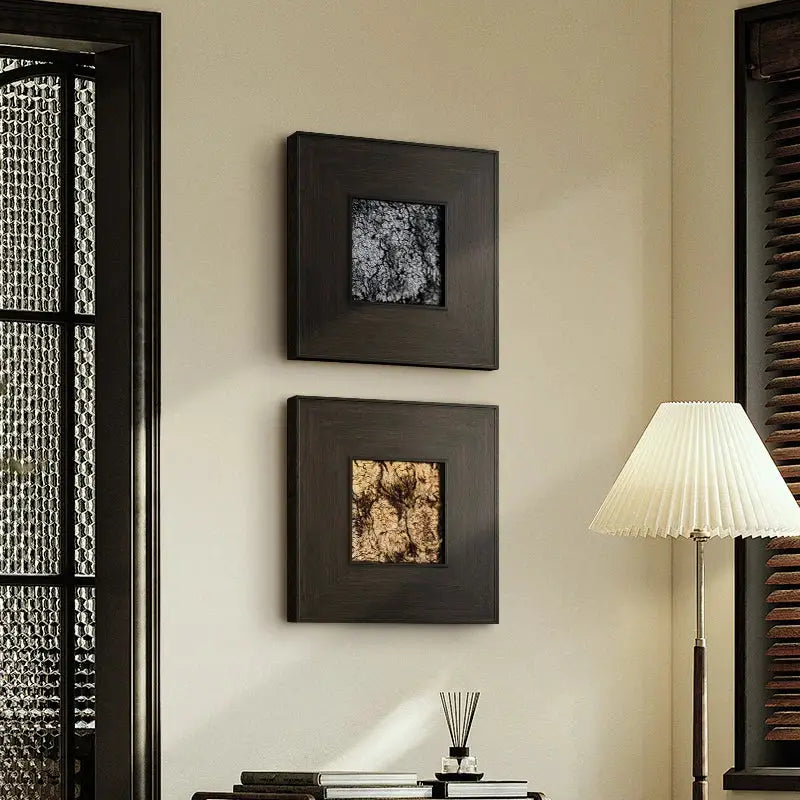Two square-framed decorbites fur decorative paintings with dark golden brown textured panels for living room decor