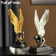 Abstract golden character winged angel resin statue with detailed feather texture on distinct bases for living room decorbites decor