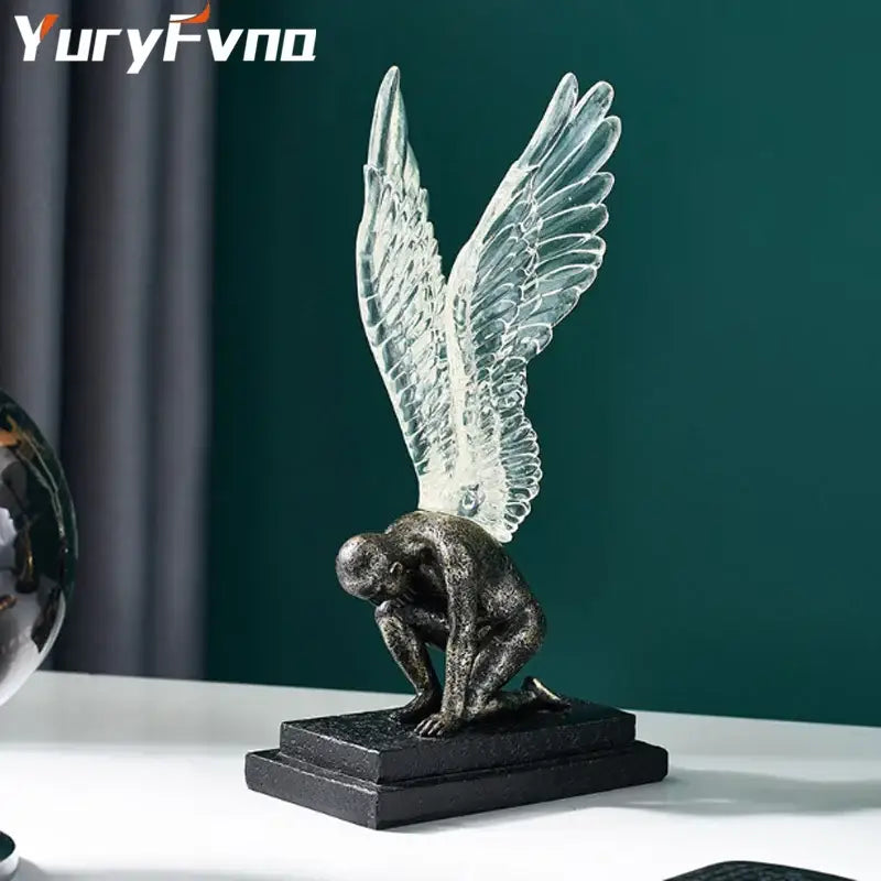 Abstract golden character winged angel resin statue with transparent glass wings on black base for living room decorbites decor