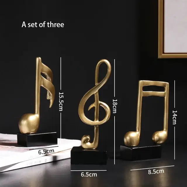 Set of three gold resin musical note sculptures on black bases for abstract golden eagle resin statue living room decor