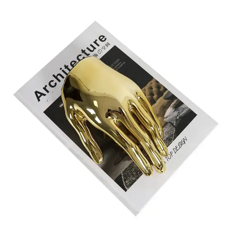Shiny gold metallic abstract golden hands resin sculpture with smooth reflective surface for living room decor